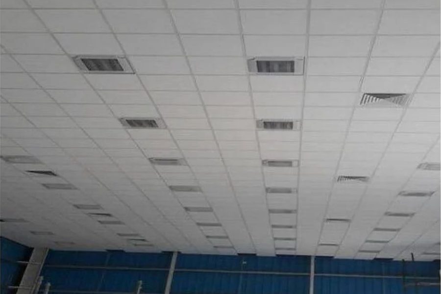 Grid ceiling installed across an office alongside partitions