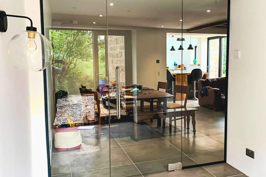 Frosted frameless glass door to a consulting room
