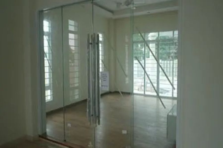 Frameless toughened glass entrance with side and over panels