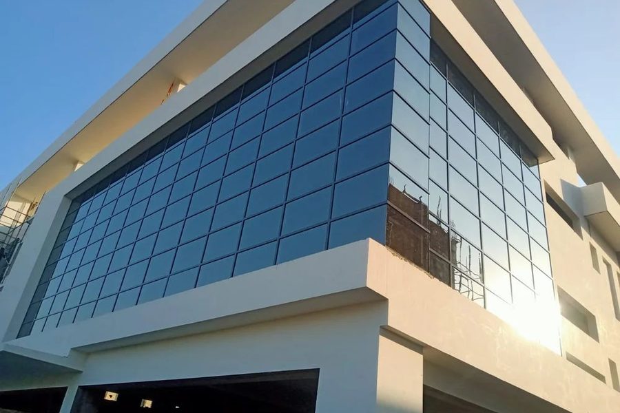 Curtain wall glazing across a commercial building elevation