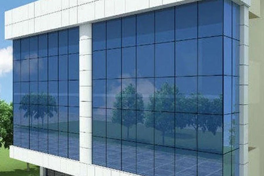 Structural glazing across an office block facade in Noida