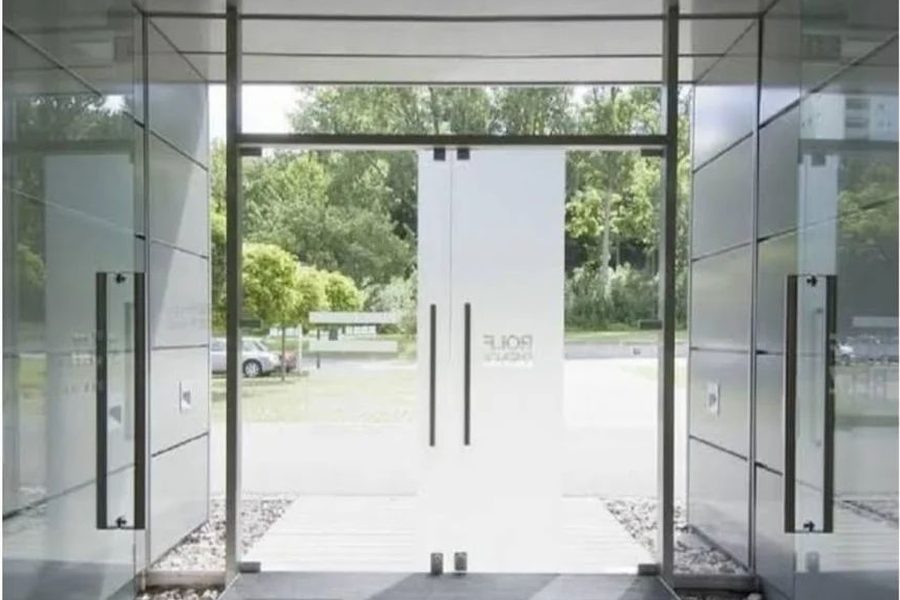 Frameless toughened glass entrance to a showroom