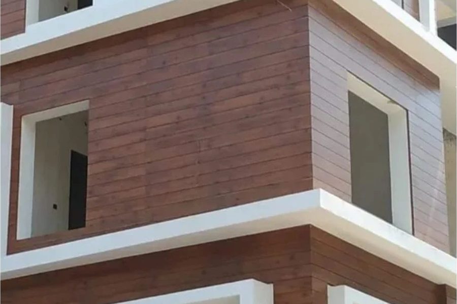 HPL panel soffit under a projecting balcony