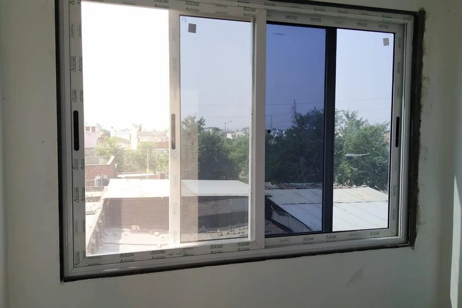 Three-track aluminium sliding window with mosquito mesh, East Delhi