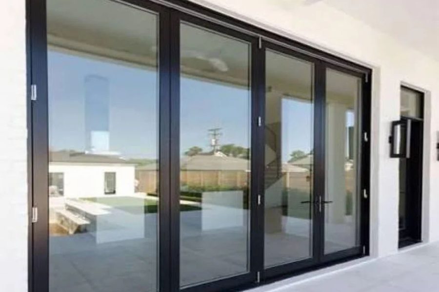 Wide Domal-Z sliding window across a living room opening